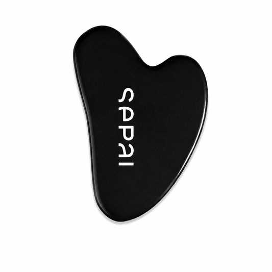Gua sha en pierre noir