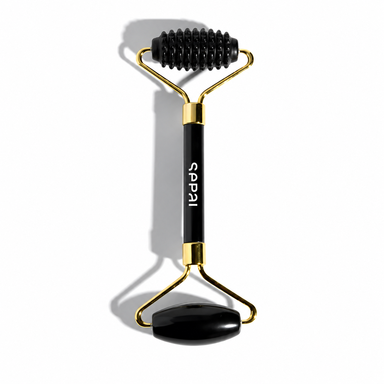 Rouleau de pierre noir massage visage