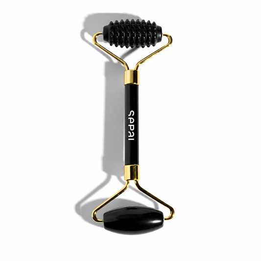 Rouleau de pierre noir massage visage